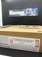 Transformers Generations Selects Shattered Glass Optimus Prime & Ratchet in hand