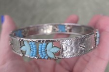 Silver Tone Embossed Blue Bead Tulip Bangle Bracelet