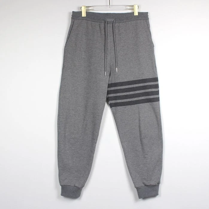 Pantaloni in jersey Thom Browne Tonal 4 barre a righe con loopback 4 MJQ008A 06910035