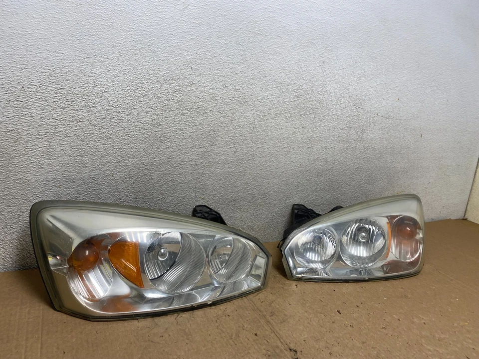 Juego de faros izquierdo+derecho Chevrolet Malibu 2004 a 2007 V3092 DW Foto 3 de 4