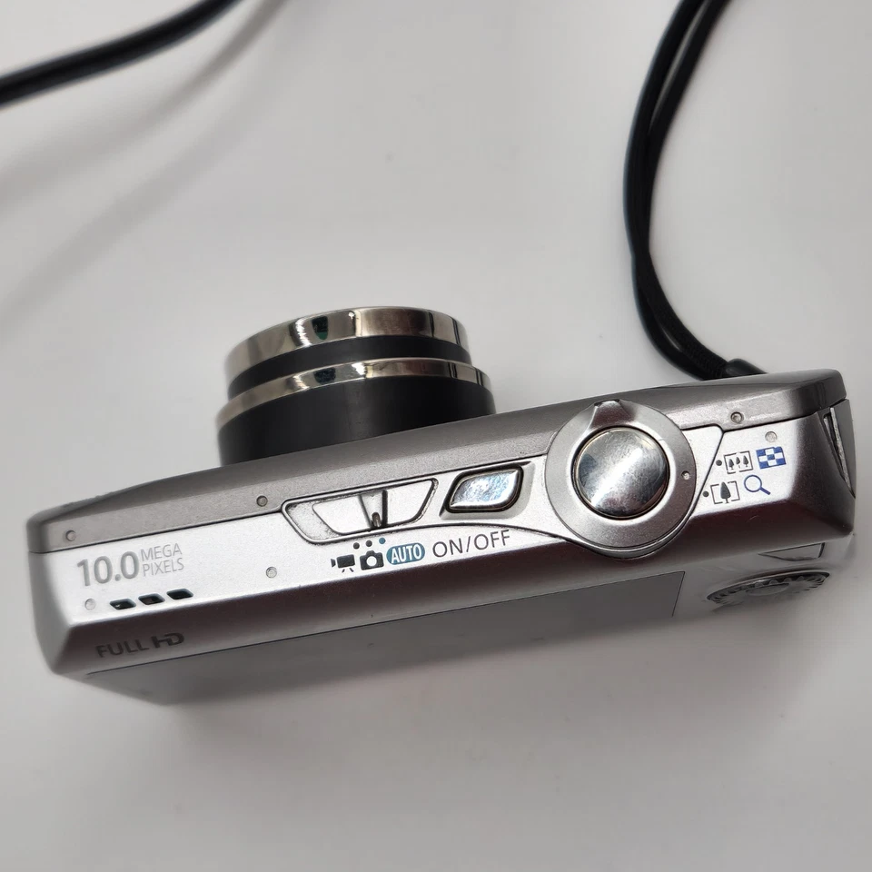 Getestet - Canon IXUS 1000 HS 10,0MP Digital Camera Silver 10x Zoom, Ladegerät - Bild 3 von 4