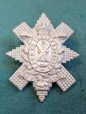 ROYAL HIGHLANDERS BLACK WATCH VICTORIAN CAP BADGE WHITE METAL ON LUGS ORIGINAL