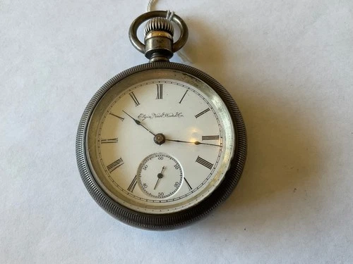 4 oz OF silver case 11 jewel Elgin 18s pocket watch stem wind & set gilt Ca 1889