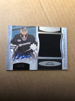 2013-14 Ultimate Collection Ultimate Threads Autograph #UATJH Jonas Hiller 23/99