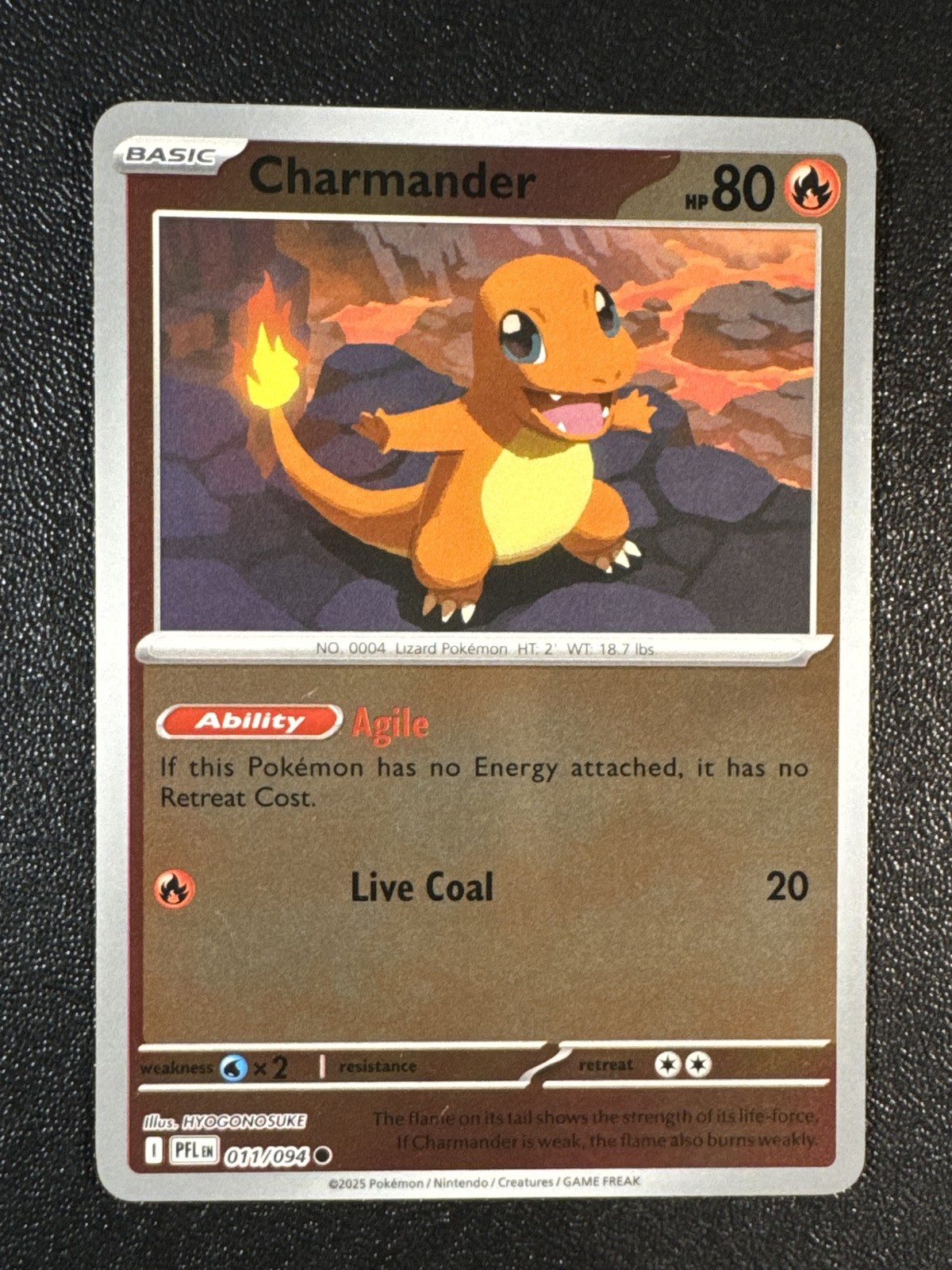 Charmander 011/094 Reverse Holo Common ME02: Phantasmal Flames NM