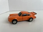 Vintage 1984 Bandai GoBots Puzzler Crossword Orange Porsche Transforming Car