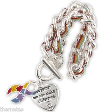 AUTISM AWARENESS CHARM BRACELET THE PIECES OF THE PUZZLE WILL BE PUT TOGETHER