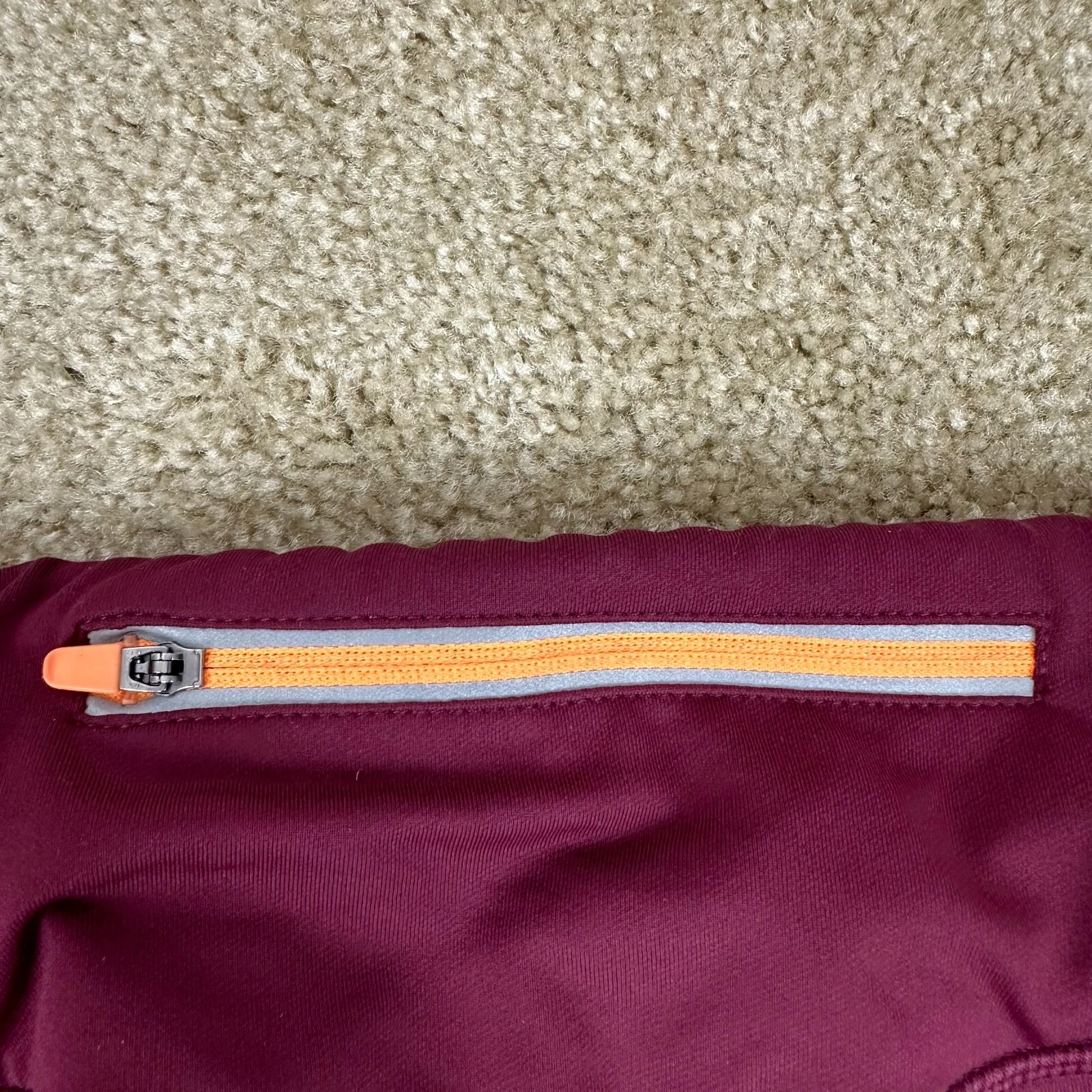 fabletics cold weather mid rise statement zip pocket leggings