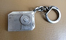 Ancien porte clé Drago métal Radio à Transistors SONOLOR, Années 60.