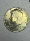 1977-D Clad Almost Uncirculated Kennedy Half Dollar