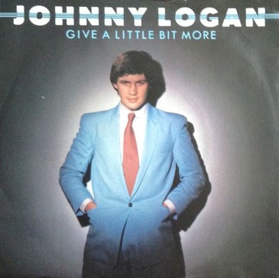 Johnny Logan   Give A Little Bit More (Too Much Too Soon) - 7'' Vinyl  ABDZ EX/EX