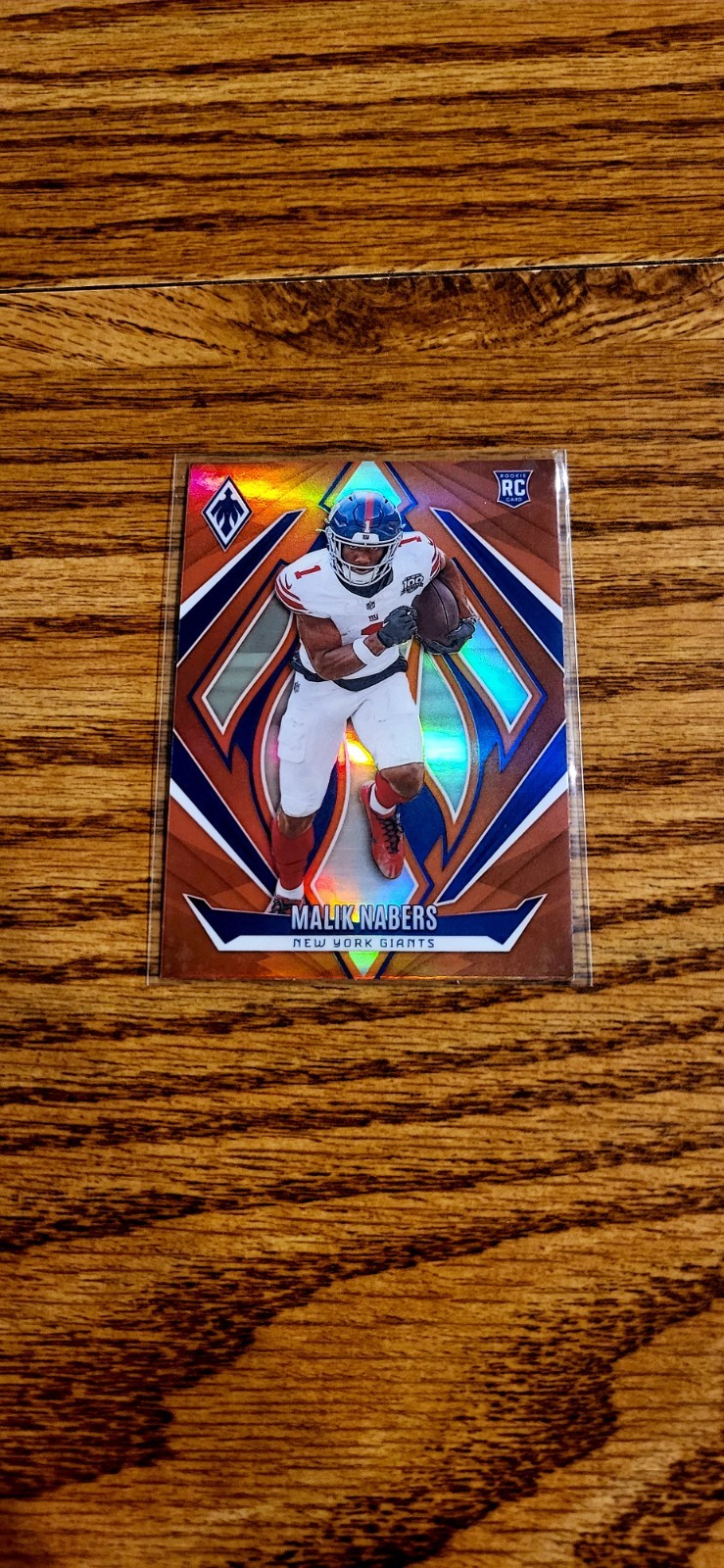 2024 Panini Phoenix - Rookies Malik Nabers #221 Orange (RC) - Prizm - Football