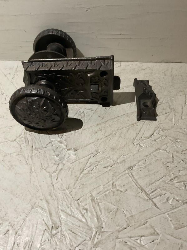 Very nice decorative small antique cast iron door lock set