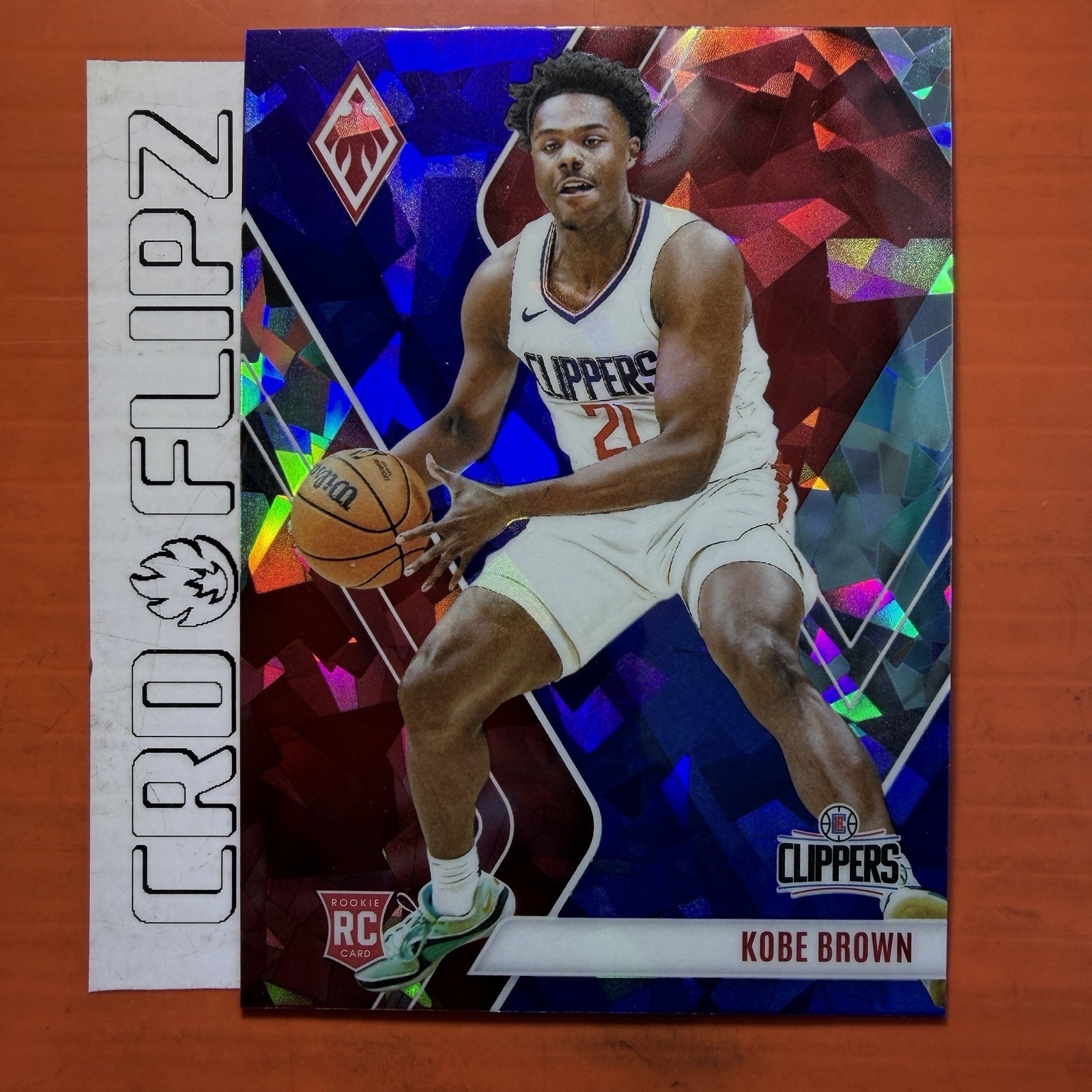 2023-24 Panini Phoenix Phoenix Blue Ice #257 Kobe Brown RC