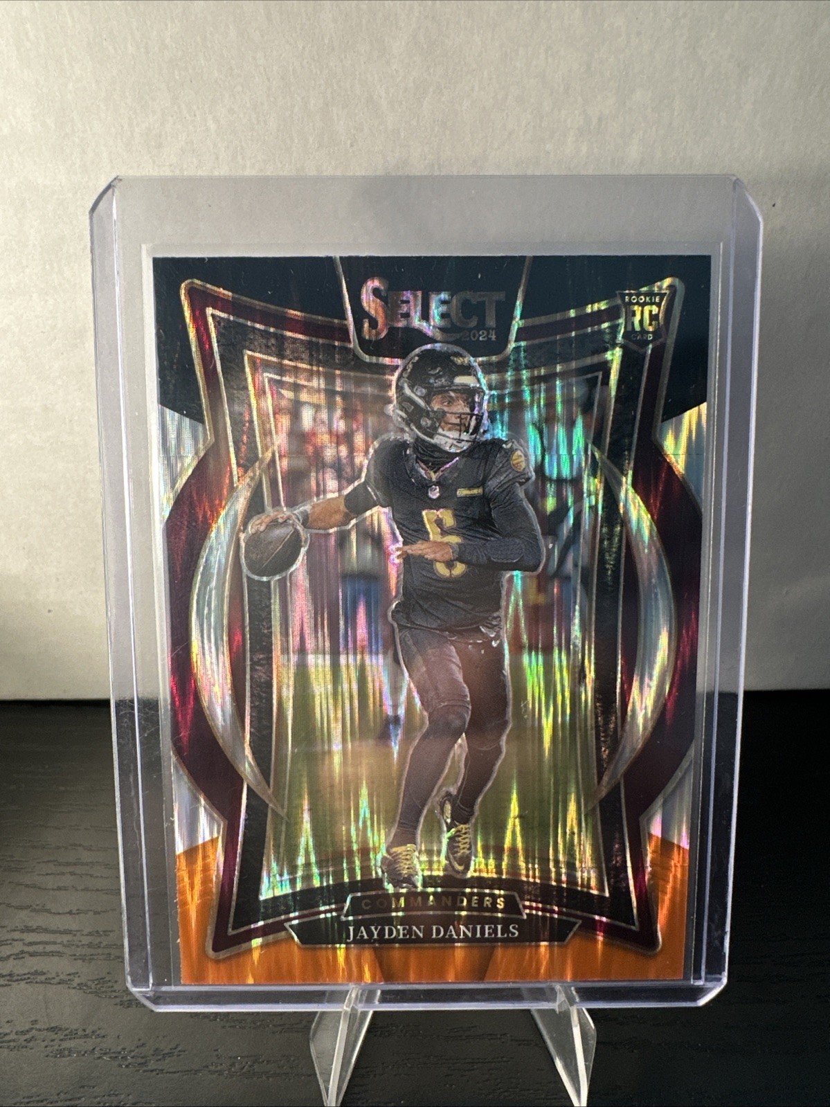 2024 Panini Select #26 Jayden Daniels Black & Orange Prizm Shock
