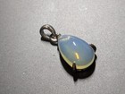 2.78 Ct. Ethiopia Natural White Pear Play-of-Color Opal Silver Pendant 14.x9.5mm — photo 3