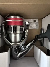 Shimano Nasci  C3000HG Spinning Reel (with 20lb Vermillion Red Power Pro Braid)
