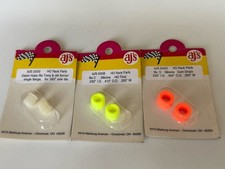 AJ  s / Aurora HO Slot - 2 Sets Rear Gummy Tires, 1 Set White Wheels NOS/MOC