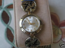 New Q Q by Citizen Silver Tone Lady Dress Watch w/Black Leaf Links