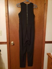 Women's Rehab Black jumper romper suit slim cutout on top and waist size Medium 