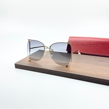 Gucci GG0252S Sunglasses Gold Frame Gray Gradient Lens New w/ Box