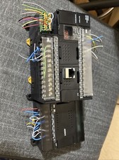 OMRON  CP1H-XA40DR-A With OMRON CP1W-AD041