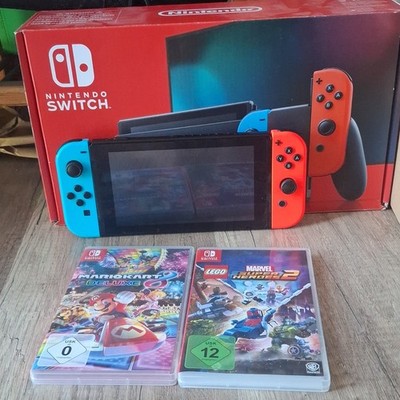 Nintendo Switch Konsole 32 GB mit JoyCon Neon RotBlau Mario KART und LEGO Marvel