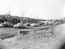 The starter gives field one-lap-to-go signal prior start final NAS- Old Photo