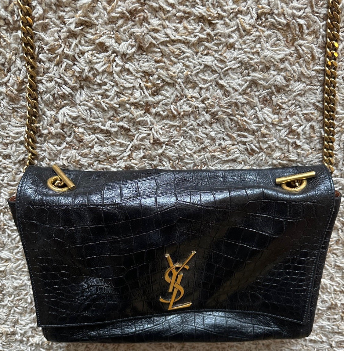 Borsa a tracolla Saint Laurent reversibile Kate con interno in pelle di pitone.