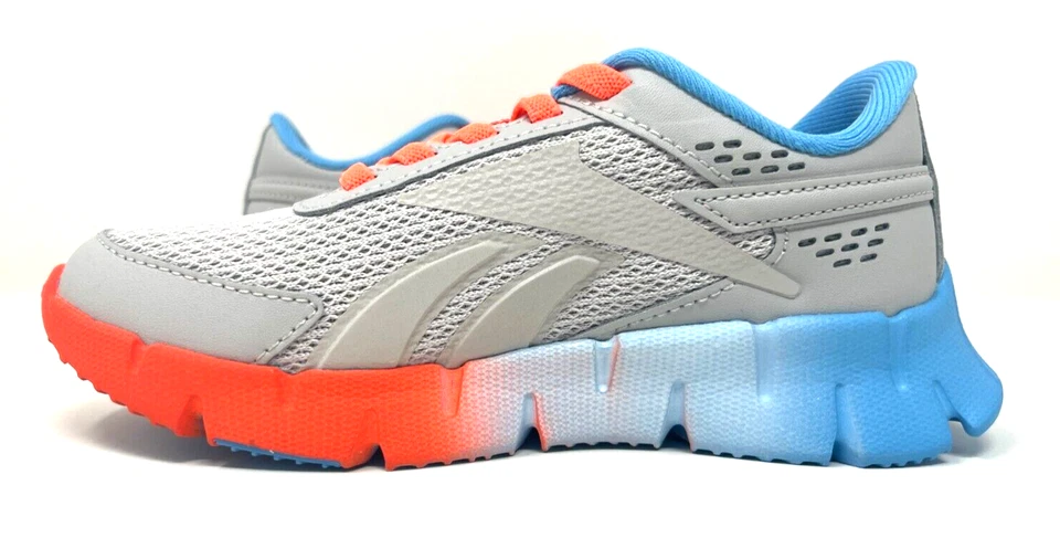 Zapatilla deportiva Reebok unisex-niño Zig Dynamica 2.0 Alt, gris/naranja/azul-10,5 niños Foto 2 de 4