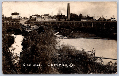 K20/ Creston Ohio RPPC Postcard c1910 Sink Hole Homes Factory 521