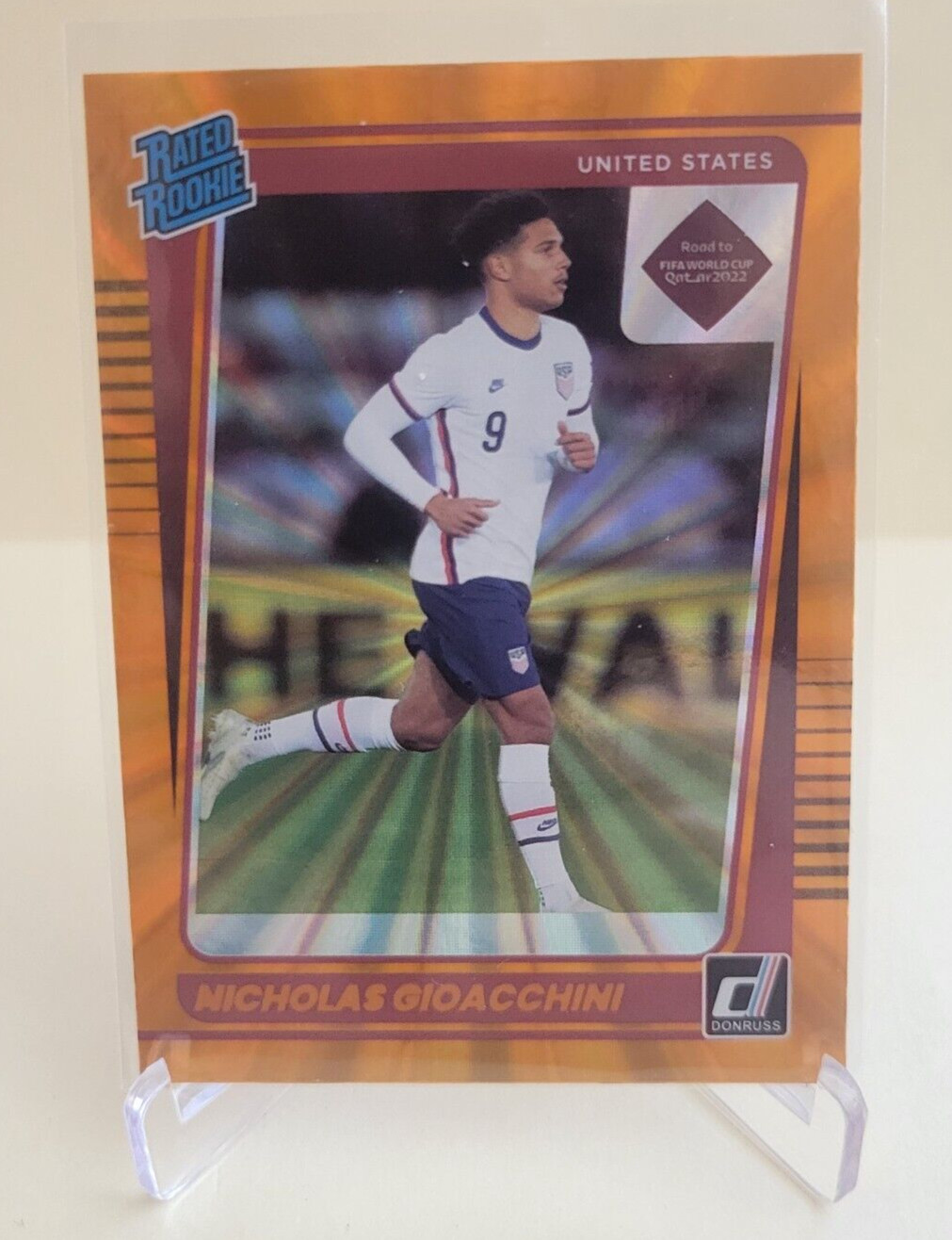 2021-22 DONRUSS ROAD TO QATAR NICHOLAS GIOACCHINI RATED RC ORANGE LASER #190 USA