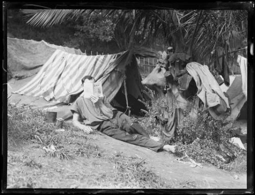 Unemployed man reading outside a tent during the Great Depress - 1930s Old Photo - Picture 1 of 1