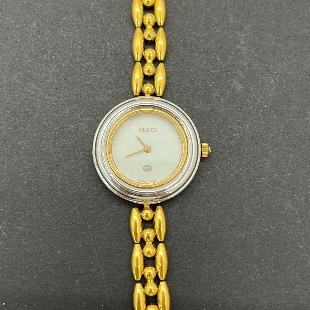 Gucci 11/12 Gold Bezel Bangle Watch with Blue Dial KI250320132 Battery Powered