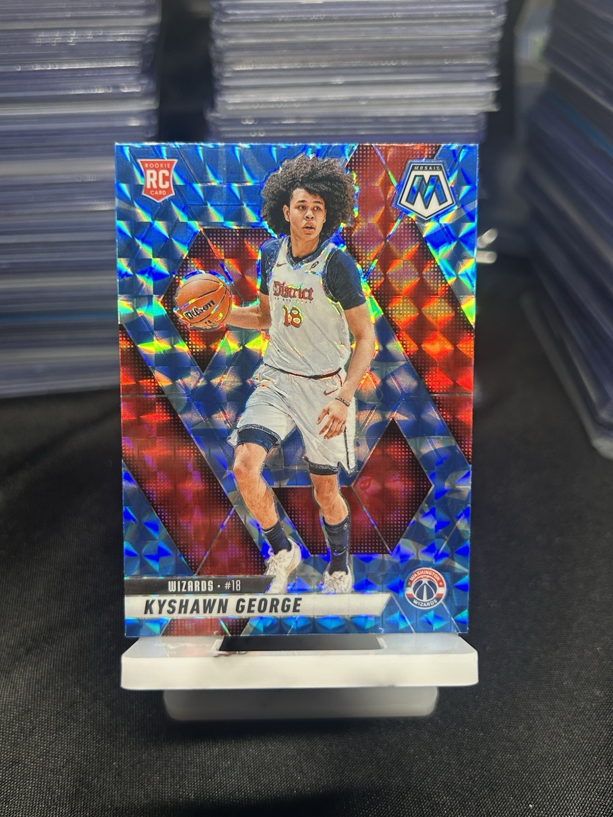 2024-25 Panini Mosaic Kyshawn George #247 Blue Reactive Prizm Rookie Wizards