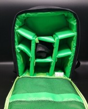 Camera Bag In Black With Green Padded Compartments With Waterproof shell