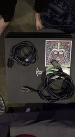 Sony PlayStation 4 Pro Console with Action/Adventure Games, Power & HDMI Cables