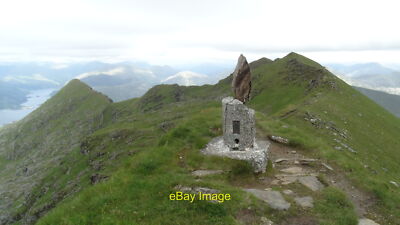 Photo 6x4 On Ladhar Bheinn summit ridge - The trig point I can only imagi c2017