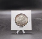 Vintage 1986 American Silver Eagle 999 Fine One Troy Ounce rim toning nice