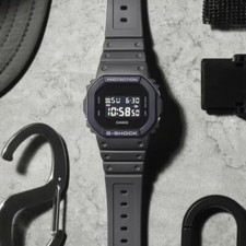 Montre pour homme Casio G-Shock DW-5610UU-8D résine grise noire numérique uti...
