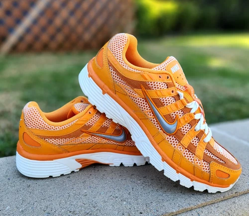 Size 11 - Nike P-6000 Premium Kumquat