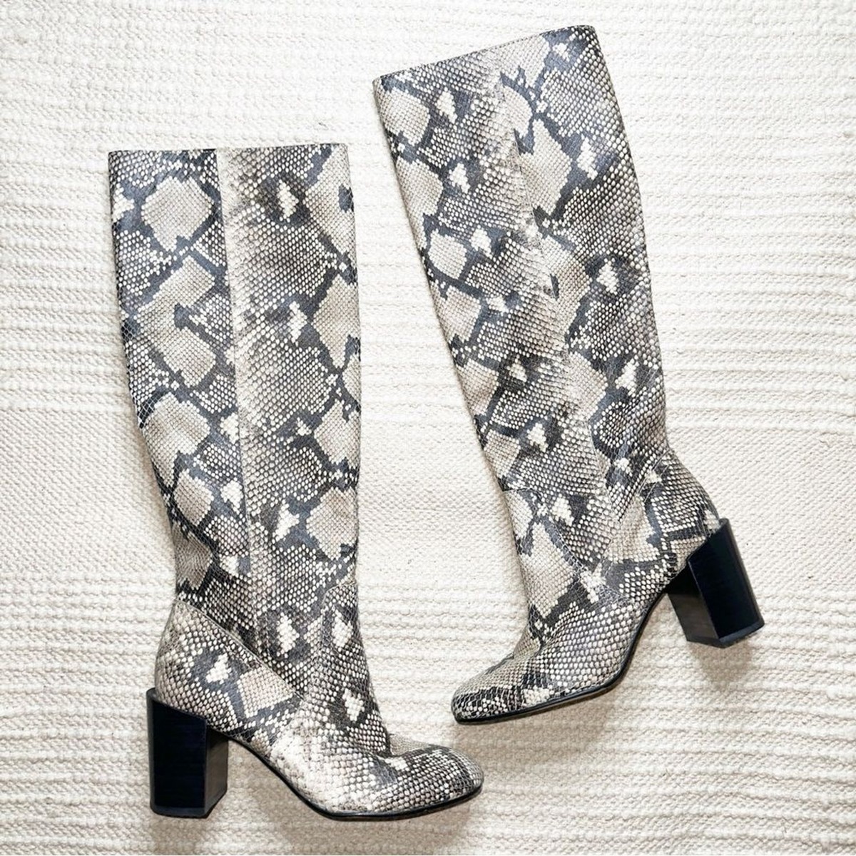 DOLCE VITA cream and black snakeskin knee high heeled boots