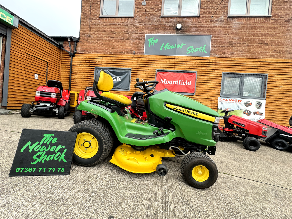 JOHN DEERE X304 WHEEL STEER HYDROSTATIC RIDE ON MOWER 42in Deck V-Twin  17HP - Main Image