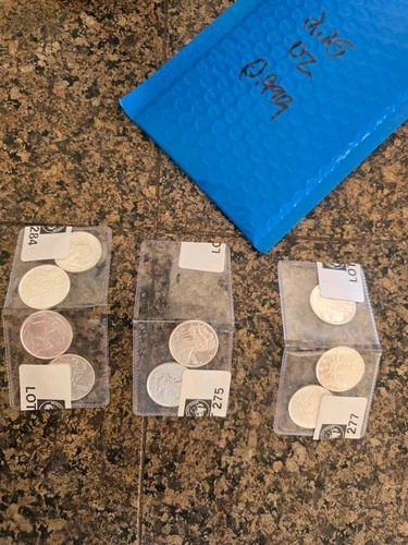 Lot 9 - 1/4 oz 999 Fine Silver A Total of 2.25 oz Silver Rounds