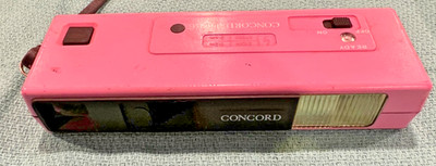 Vintage Concord 110CEF Neon Lites Pocket Camera Electronic Flash Pink UNTESTED