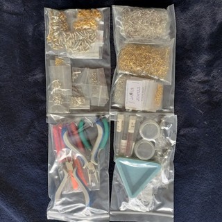 Selection of beading tools jewellery findings and beads