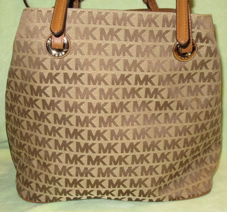 How to clean mk on sale bag