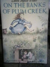 On the Banks of Plum Creek - Paperback By Laura Ingalls Wilder - GOOD