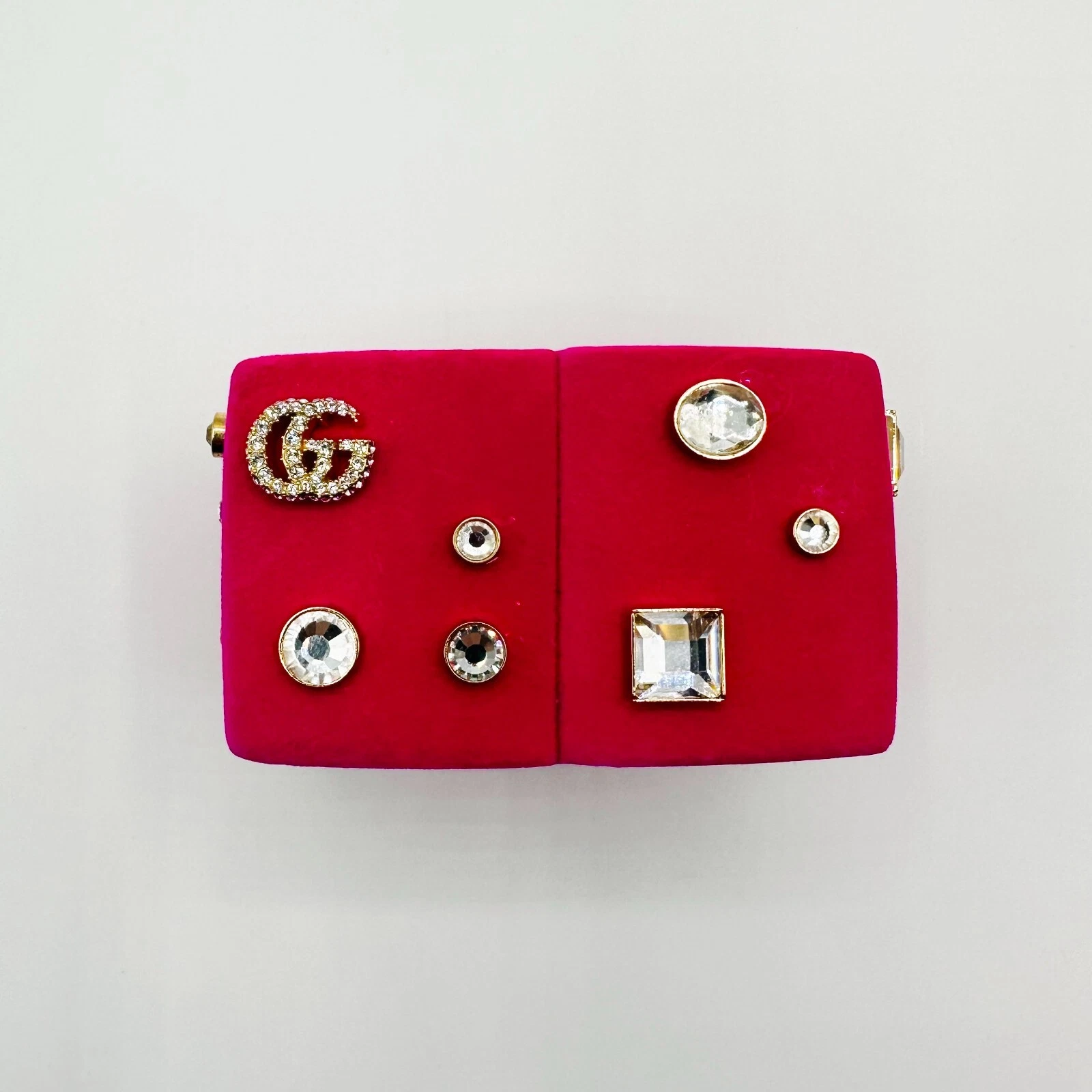 Bracelet brassard en résine feutrée rose chaud Gucci avec goujons en cristal logo GG S 629652 6454