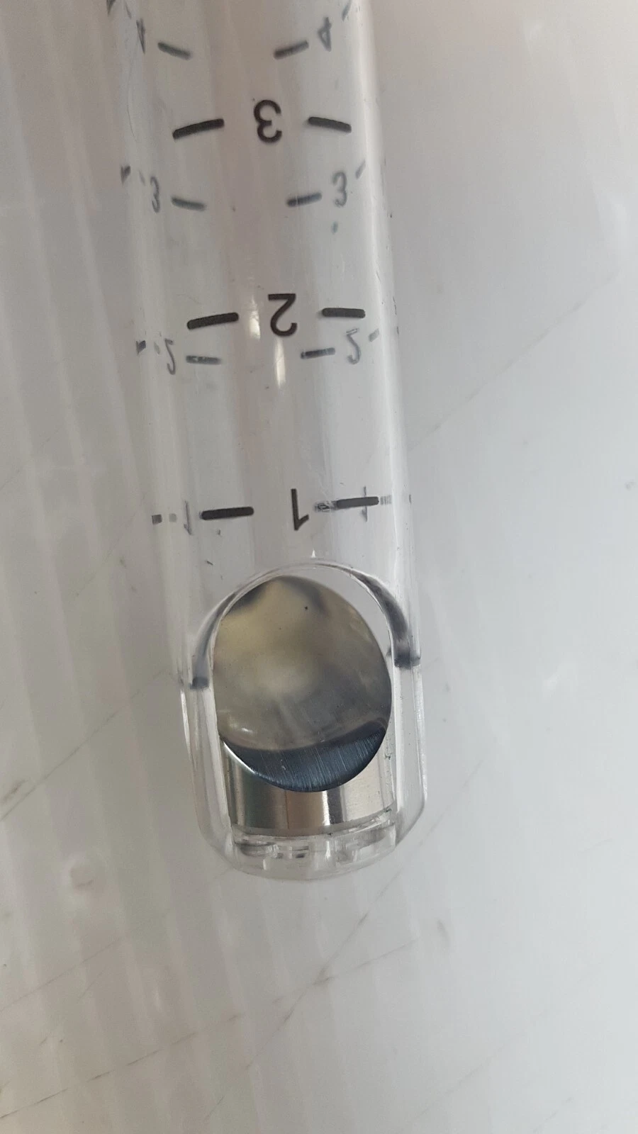 Close-up of the metal insert and graduations at the end of a Lumenis tip